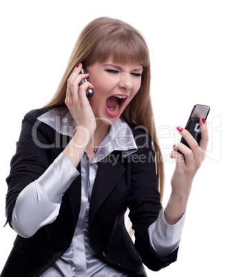Stressed business woman with two cell phones