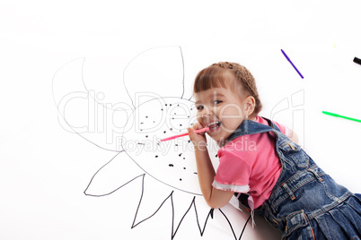 Happy little girl drawing