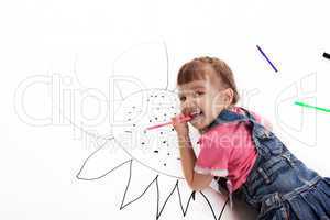 Happy little girl drawing