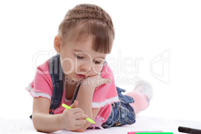 Little girl drawing on floor