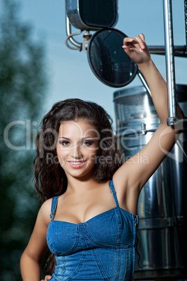 Pretty young woman and truck