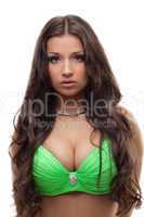 Beautiful oriental dancer in green suit with hair