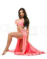 Beautiful oriental dancer in pink costume