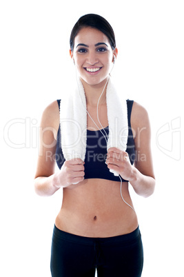 Fit woman listening to music