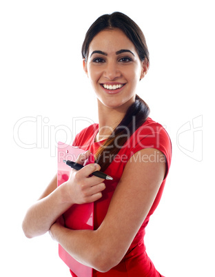 Smiling modern girl holding clipboard