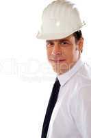 Smiling male architect wearing hard hat