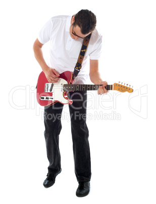 Casual man with guitar looking down