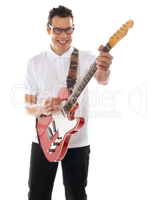 Man with guitar enjoying music