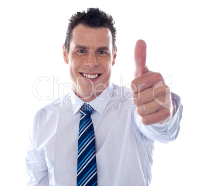 Corporate man showing thumbs up