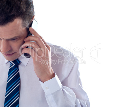 Cropped image of man talking on cell phone