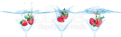Collage Fresh Strawberry Dropped into Glass with Splash