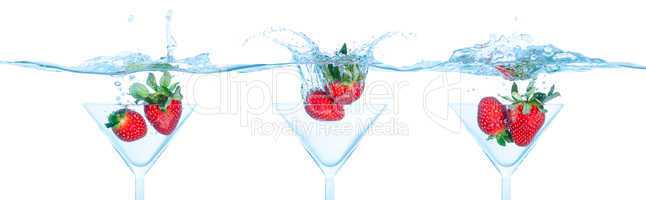 Collage Fresh Strawberry Dropped into Glass with Splash