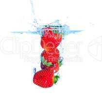 Fresh Strawberry Dropped into Water with Splash