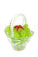 Glass basket full of grapes  and red currants
