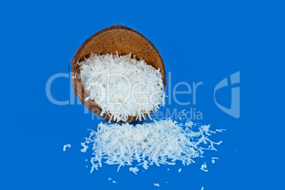 Coconut shell full of coconut meal