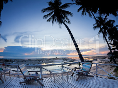 Cafe outdoor with terrace on sunset beach