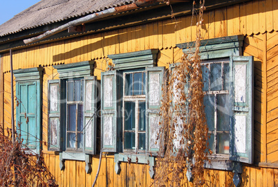 old dirty windows on old  wall