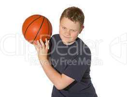 Teenager playing with a basketball