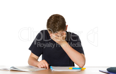 Teenager overwhelmed by his studies