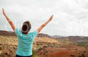 Woman with raised hands