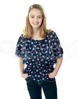 Stylish girl posing with hands in pocket