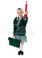 Full length shot of school girl with bag