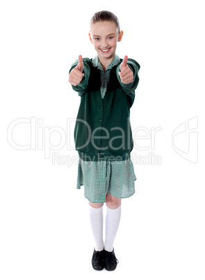 Double thumbs up by young american girl