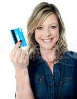 Pretty attractive lady showing credit card