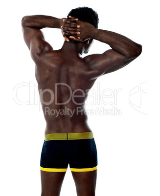 Rear view of muscular young man