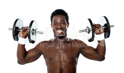 Male athlete holding dumbbells