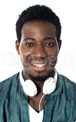 Guy with headphones around his neck