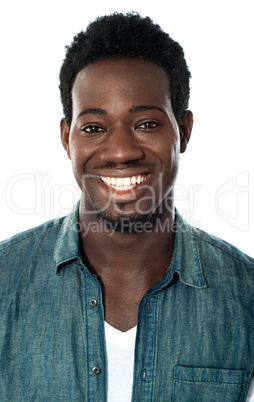 Closeup of cheerful young african guy