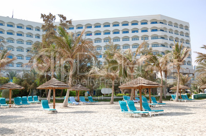 Beach and building of the luxury hotel, Ajman, UAE