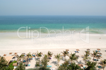 Beach and turquoise water of the luxury hotel, Ajman, UAE