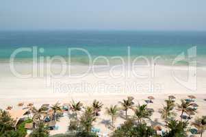 Beach and turquoise water of the luxury hotel, Ajman, UAE