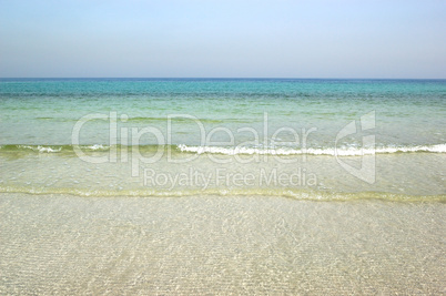Beach and turquoise water of the luxury hotel, Ajman, UAE