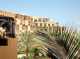 Building of the luxury hotel and palm frond, Ras Al Khaimah, UAE