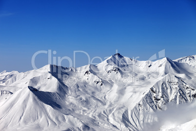 Snowy mountains and blue sky