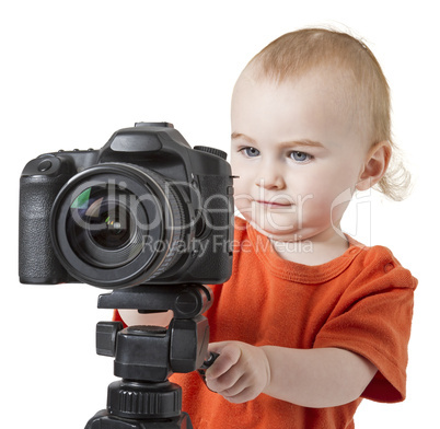 young child with digital camera