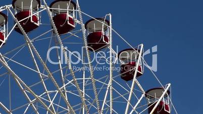 Ferris wheels  against blue sky