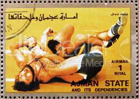Postage stamp Ajman 1973 Wrestling, Olympic sports