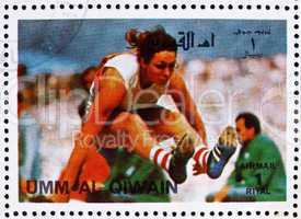 Postage stamp Umm al-Quwain 1972 Long Jump, Summer Olympics, Mun