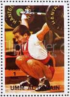 Postage stamp Umm al-Quwain 1972 Weightlifting, Summer Olympics,