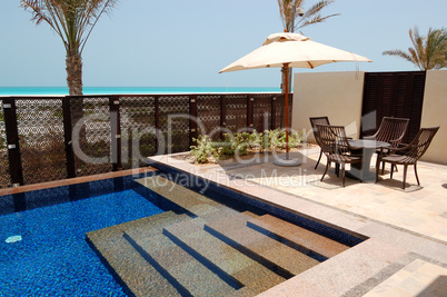 Swimming pool near beach of the luxury hotel, Saadiyat island, A