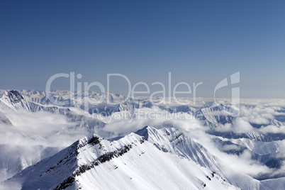 Snowy mountains in haze