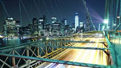 city traffic on Brooklyn bridge at night. Time lapse and loopable