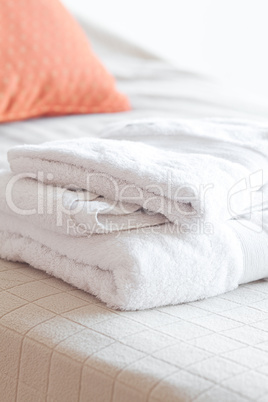 white towels lying on the bed