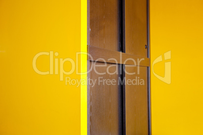 wardrobe and yellow wall in the apartment