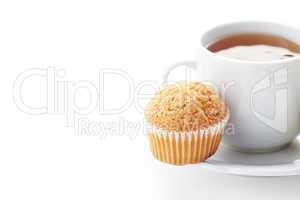 cup of tea and muffin isolated on white