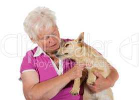 Loving elderly woman with her dog